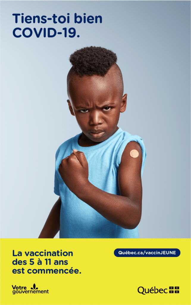 Affiche « Tiens-toi bien, COVID-19 » : grimace d’un enfant au poing levé, la vaccination des 5 à 11 ans est commencée, Gouvernement du Québec